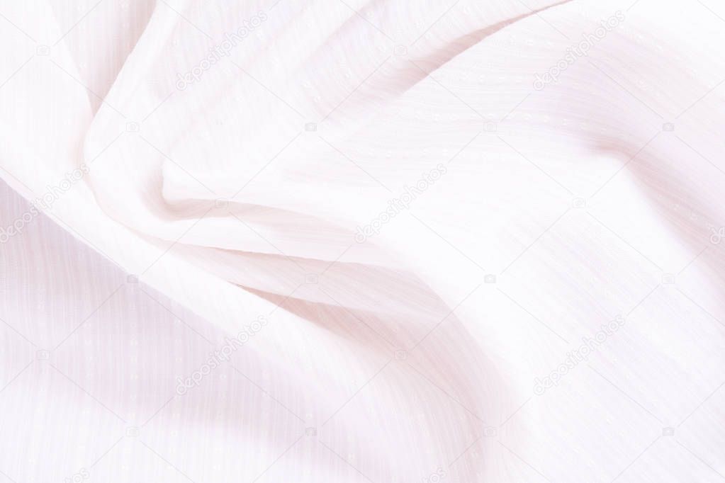 texture of white cotton fabric with arbitrary bends and wave, abstract background