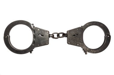 Beyaz arka plan üzerinde küçük çizikler ile siyah metal kelepçe