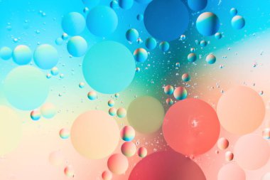 bir arada petrol ve su ile bir fantastik soyut makro arka plan bulanıklık öğeleri ve çerçeve çevre boyunca hareket