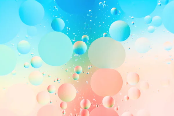 Mischen von Wasser und Öl, schöne Farbe abstrakten Hintergrund auf Kreisen und Ovalen basiert — Stockfoto