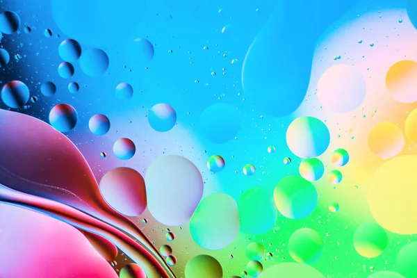 Blanda vatten och olja, vacker färg abstrakt bakgrund baserat på ringar och ovaler — Stockfoto