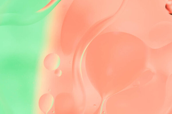 mix water and oil, color background with soft defocusing, macro abstract