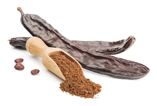 Carob powder and pods isolated on white — Stock Photo, Image