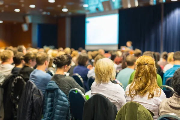 Audience in lecture hall participating at business event. — Stock Photo, Image