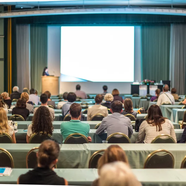 Audience in lecture hall participating at business conference. — Stock Photo, Image