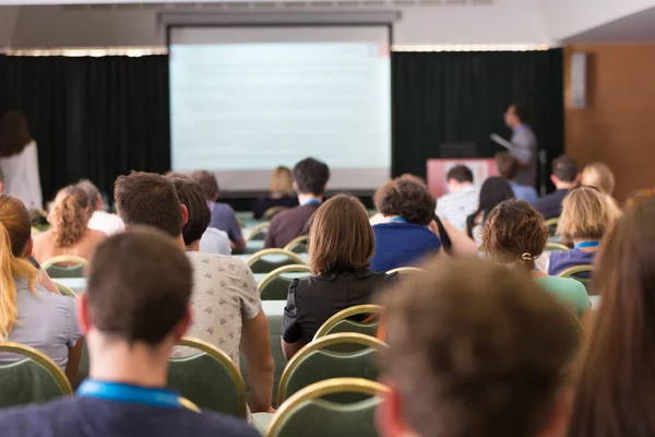 Audience in lecture hall participating at business conference. — Stock Photo, Image