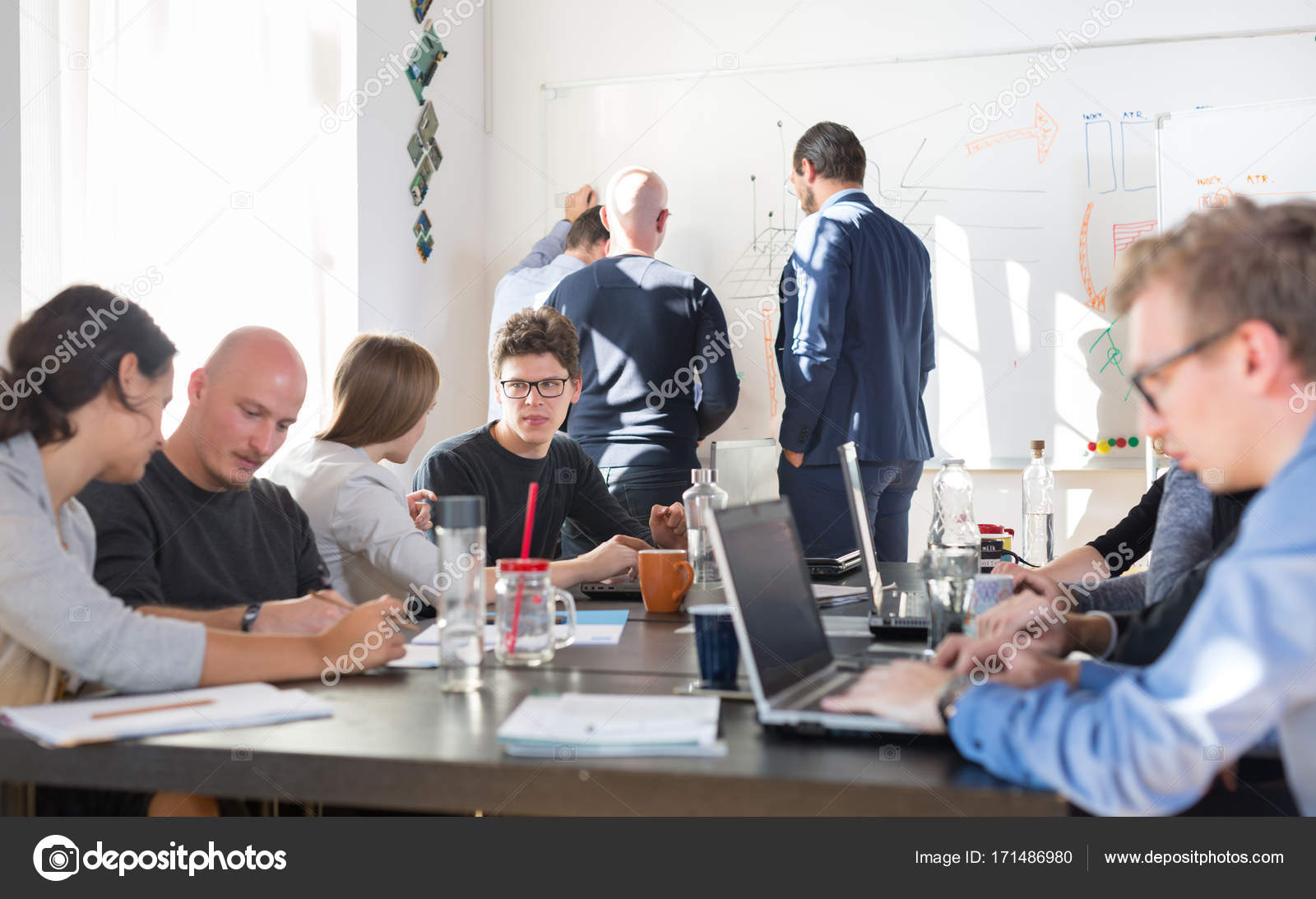 Relaxed informal IT business startup company team meeting. — Stock