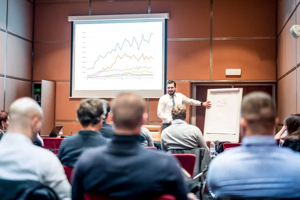 Speaker Giving a Talk at Business Meeting.