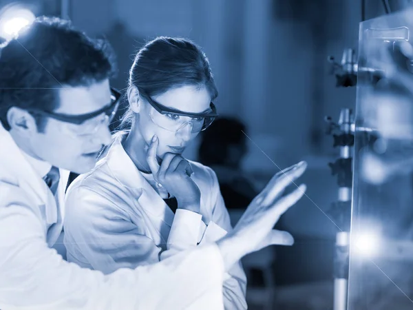 Engineers focusing on the discovery — Stock Photo, Image