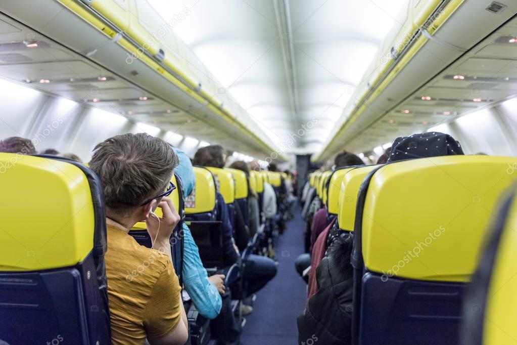 Interior of commercial airplane during flight.