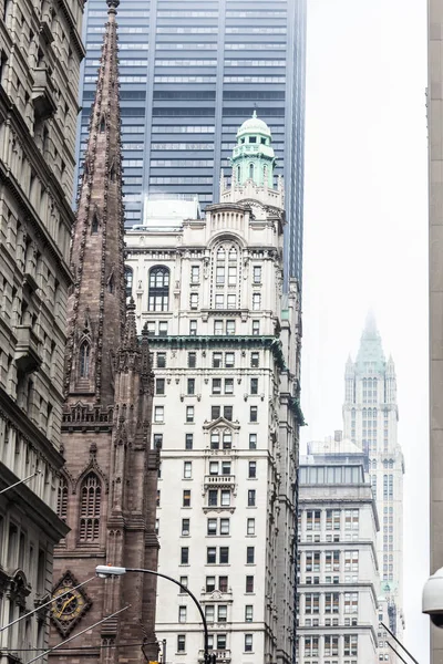 New York City, Lower Manhattan, skyscrapers on Broadway street.