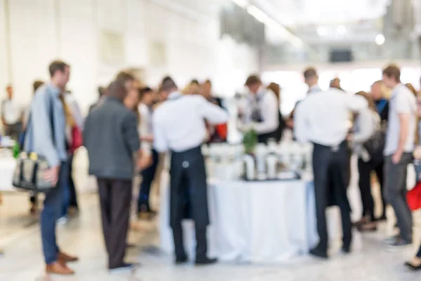 Blured image of businesspeople at coffee break at conference meeting. — Stock Photo, Image