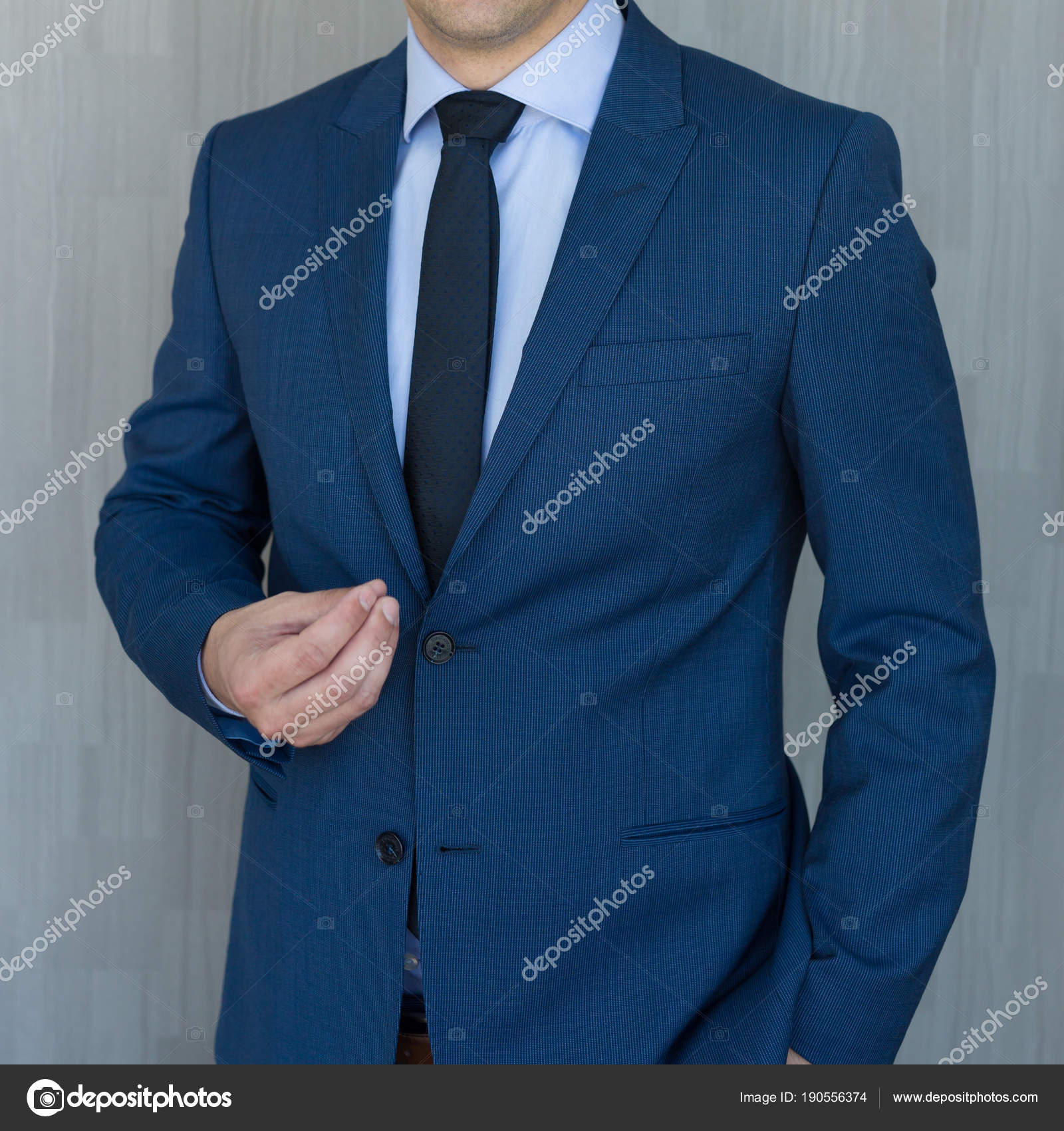 Torso Of A Businessman Standing Making Italian Hand Gesture