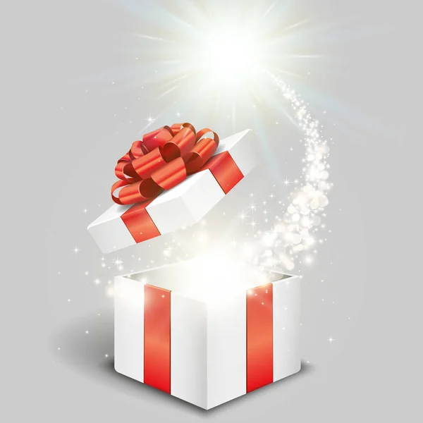 Caja de regalo abierta y luz mágica — Vector de stock