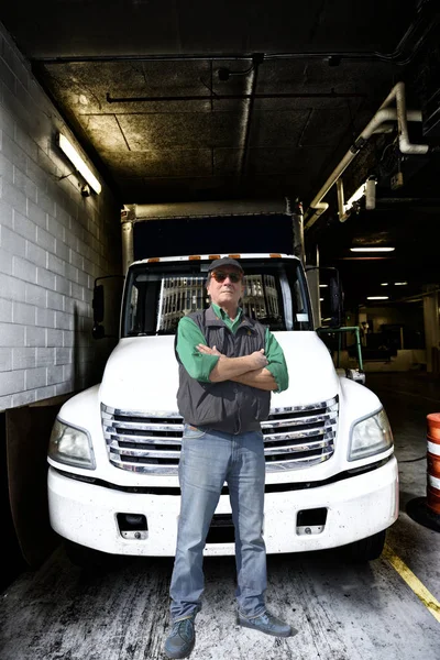 Mature man truck driver