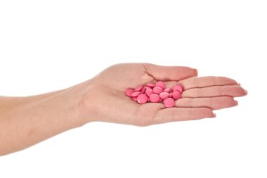 el ile üzerine beyaz izole renkli hapları