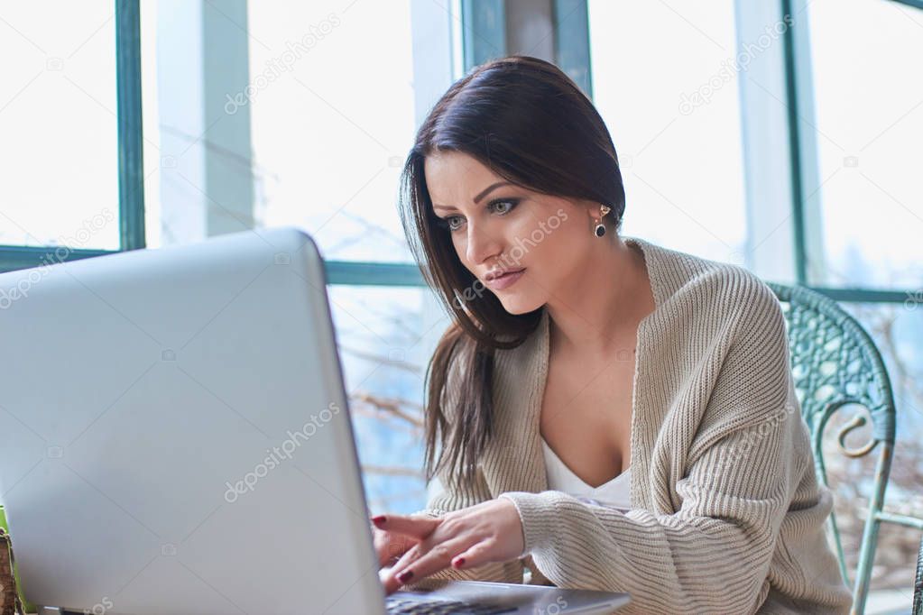 Young woman working with computer 