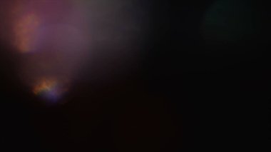 Güzel ışık sızıntılarının fotoğrafı. Bokeh ışık efektleri. Moda Lens Fişeği. Renk efektleri posteri, afiş, duvar kağıdı, başlıklar için doku vs....