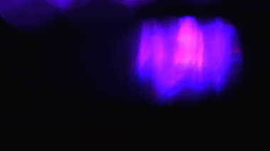 Güzel ışık sızıntılarının fotoğrafı. Bokeh ışık efektleri. Moda Lens Fişeği. Renk efektleri posteri, afiş, duvar kağıdı, başlıklar için doku vs....