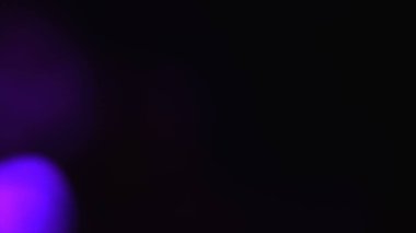 Güzel ışık sızıntılarının fotoğrafı. Bokeh ışık efektleri. Moda Lens Fişeği. Renk efektleri posteri, afiş, duvar kağıdı, başlıklar için doku vs....