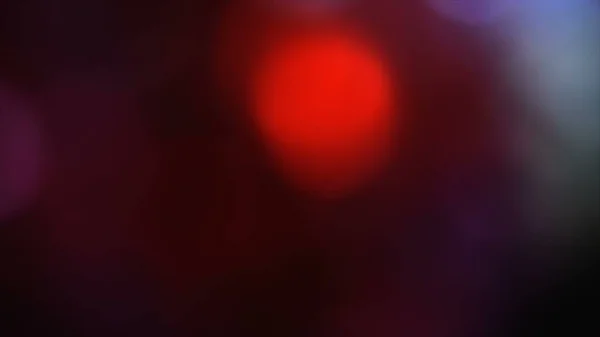 Güzel ışık sızıntılarının fotoğrafı. Bokeh ışık efektleri. Moda Lens Fişeği. Renk efektleri posteri, afiş, duvar kağıdı, başlıklar için doku vs....