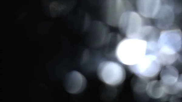 Güzel ışık sızıntılarının fotoğrafı. Bokeh ışık efektleri. Moda Lens Fişeği. Renk efektleri posteri, afiş, duvar kağıdı, başlıklar için doku vs....