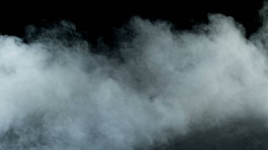 Siyah arka planda Real Smoke 'un fotoğrafı. Farklı projeler için gerçekçi bir örtüşme. Bulutlar sis, sis, sis, buhar.