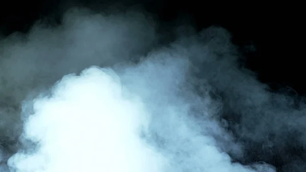 Photo of Real Smoke on a black background - realistic overlay for different projects. Clouds fog, mist, haze, vapor.