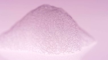 Köpüklü Makro atışı. Temiz, zarif, parlak bir fotoğraf arkaplanı. Köpük köpüklü sabun köpükleri. Dezenfekte fotoğrafı. Köpük Arkaplanı. Kızıl Ejder kamerasına ateş et..