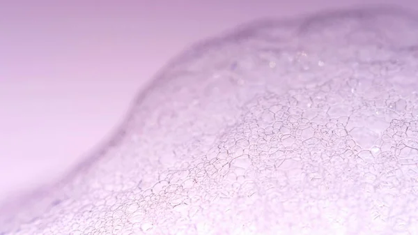 Foam Macro shoot. Clean soft elegant bright photo background. Close-up Soap foam popping bubbles. Washing disinfection photo. Froth Backdrop. Shoot on Red Dragon camera still.