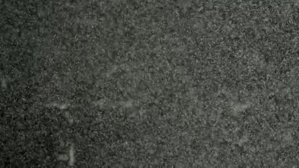 Tournage macro de bulles sous-marines séquences bokeh. Fond de surface d'eau. Des images sous-marines pour toile de fond. Élégante et détaillée poussière flottant. Bulles d'eau. Tourné sur caméra rouge au ralenti .