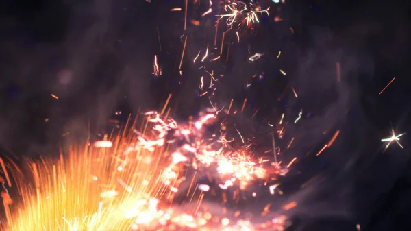 Macro photo of Bonfire sparks. Fire Flames bursts, blasts. Explosion micro sparkles. Mini Fireworks. Shooting on Red camera still on black background. Beautiful leaks overlay spark poster, banner, wallpaper, backdrop, texture.
