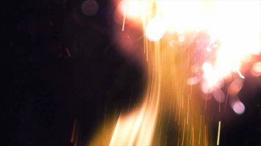 Şenlik ateşi kıvılcımlarının Macro fotoğrafı. Alevler patlar, patlamalar. Patlama mikro parlaklığı. Mini Havai fişekler. Kırmızı kamerada çekim hala siyah arkaplanda. Güzel sızıntılar kıvılcım posteri, afiş, duvar kağıdı, arkaplan, doku.