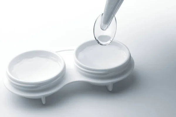 Contact lens and case — Stock Photo, Image