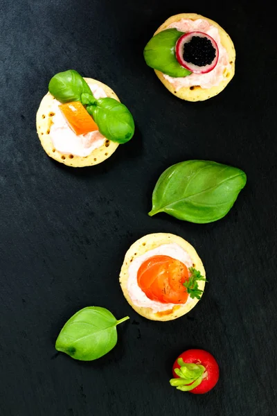 Homemade pancake canapes on slate stone plate for finger food party — Stock Photo, Image