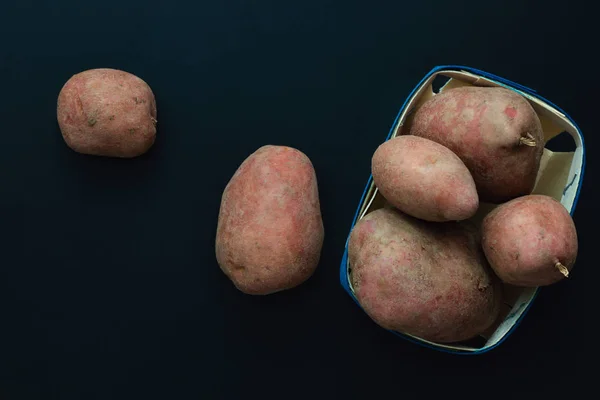 Organic food concept top view fresh red potatoes with copy space — Stock Photo, Image