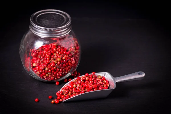 Food Spice concept Organic Pink Peppercorn or pink berry on blac — Stock Photo, Image