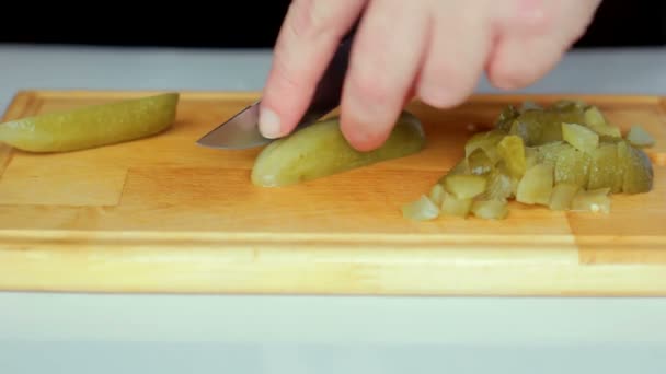 A man cuts with a knife pickles — Stock Footage A man cuts with a knife pickles Royalty Free Stock Video
