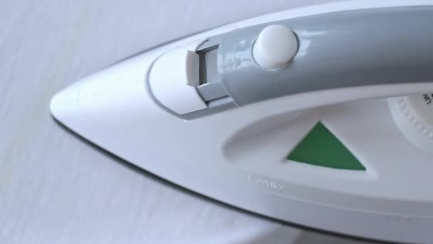 Irons white shirt. big Close-up — Stock Footage Irons white shirt. big Close-up Video Clip