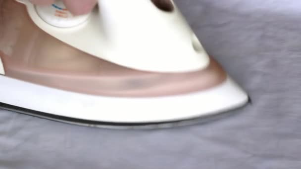 Close-up Ironing a white shirt iron — Stock Footage Close-up Ironing a white shirt iron Royalty Free Stock Footage