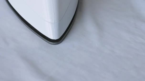 Irons white shirt. big Close-up — Stock Footage Irons white shirt. big Close-up Video Clip