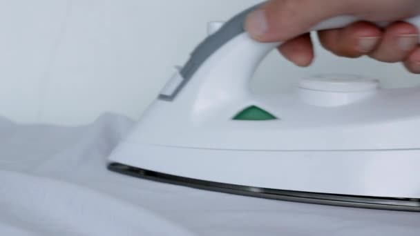 Irons white shirt. big Close-up — Stock Footage Irons white shirt. big Close-up Video Clip