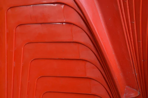 Abstrait Couleur Sur Les Piles Rouges Chaises Plastique — Photo