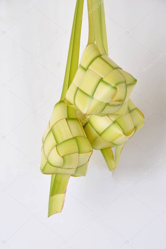 new leaf woven ketupat on white background