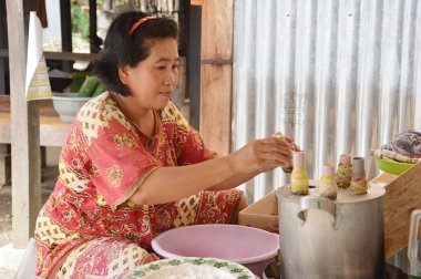 SIDRAP, INDONESIA, 10th January 2014 : Putu cake maker at Sidrap Indonesia