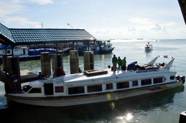 TARAKAN, INDONESIA - MAY, 13, 2016 : loading and unloading activities on the Tengkayu seaport Tarakan Indonesia