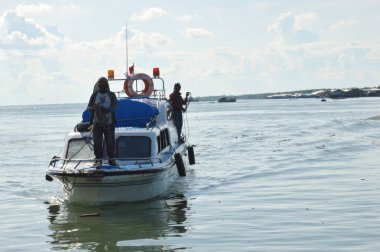 TARAKAN, INDONESIA - MAY, 13, 2016 : a speedboat loading passengers from outside the island of Tarakan getting docked on the Tengkayu seaport Tarakan Indonesia
