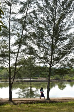 TARAKAN, INDONESIA - 30th MAY 2016 : Muslim girls by the pool