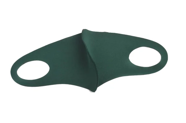 白い背景に隔離された緑の布マスク — ストック写真