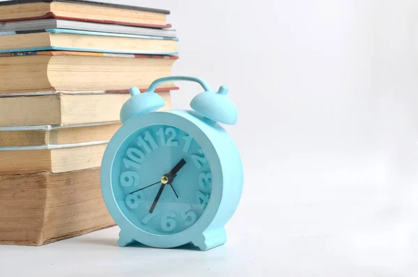 Stack Books Blue Alarm Clock White Background — Stock Photo, Image